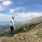 Woman Standing on Mountain - things to do in Yellowstone