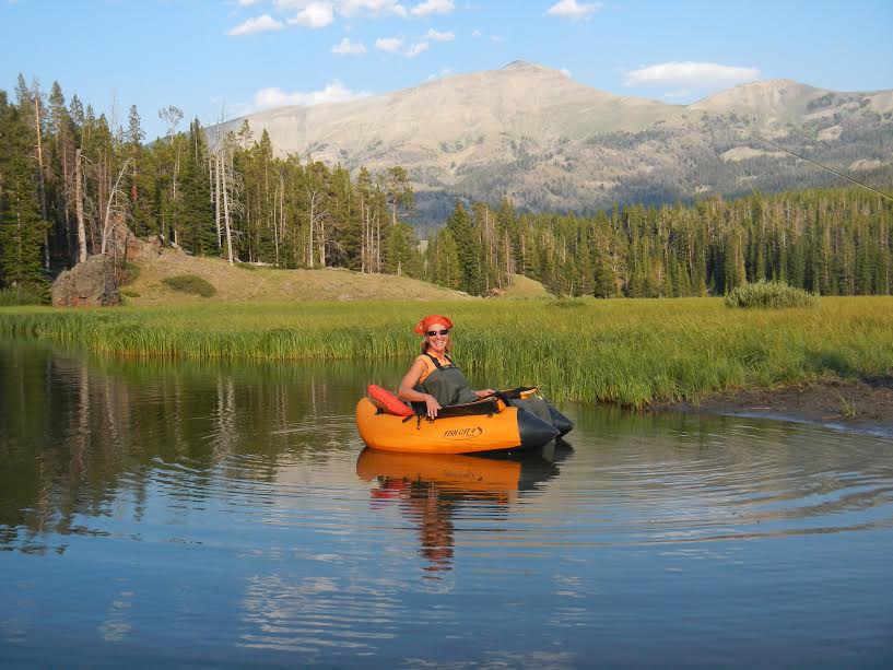 Woman Wearing Chest Waders on the Lake - Yellowstone Activities and Things to do