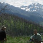 People in Front of Mountains - Yellowstone Vacations