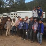 Group Photo by the Trailer - Yellowstone Horseback Riding Trips